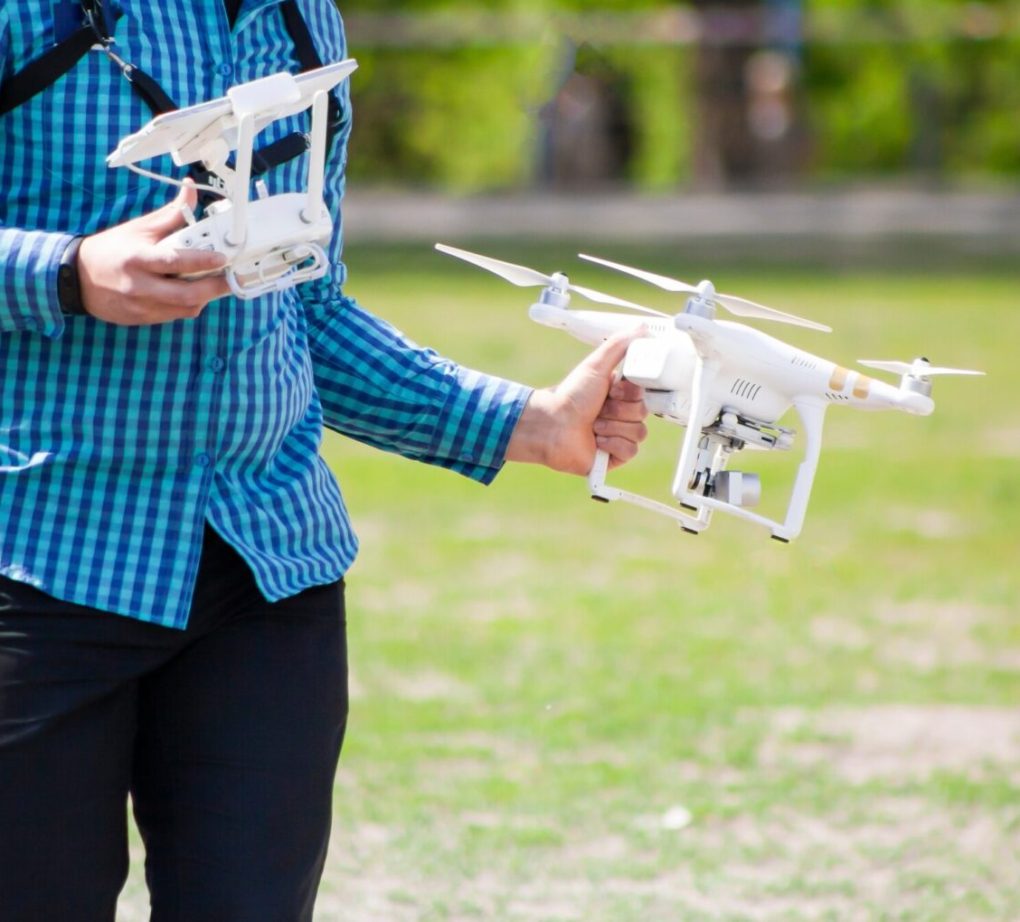 a-male-drone-pilot-is-holding-a-remote-control-la-2022-11-09-15-16-43-utc